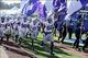 Nov 30, 2013; Lawrence, KS, USA; Kansas State Wildcats linebacker Tre Walker (50) leads the team onto the field before the game against the Kansas Jayhawks at Memorial Stadium. Kansas State won the game 31-10. Mandatory Credit: John Rieger-USA TODAY Sport