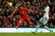 LIVERPOOL, ENGLAND - DECEMBER 07: Luis Suarez of Liverpool shoots at goal during the Barclays Premier League match between Liverpool and West Ham United at Anfield on December 7, 2013 in Liverpool, England. (Photo by Clive Brunskill/Getty Images)