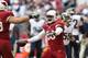 GLENDALE, AZ - DECEMBER 08: Inside linebacker Karlos Dansby #56 of the Arizona Cardinals reacts after an interception touchdown against the St. Louis Rams during the third quarter of the NFL game at the University of Phoenix Stadium on December 8, 2013 i