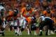 DENVER, CO - SEPTEMBER 5: Quarterback Peyton Manning #18 of the Denver Broncos audibles at the line of scrimmage against the Baltimore Ravens during the game at Sports Authority Field at Mile High on September 5, 2013 in Denver Colorado. (Photo by Dustin