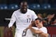 PRETORIA, SOUTH AFRICA - JUNE 23: Landon Donovan of the United States celebrates scoring the winning goal with team mates Clint Dempsey and Jozy Altidore that sends the USA through to the second round during the 2010 FIFA World Cup South Africa Group C
