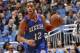 ORLANDO, FL - NOVEMBER 27: Evan Turner #12 of the Philadelphia 76ers dribbles up the court against the Orlando Magic during the game on November 27, 2013 at Amway Center in Orlando, Florida. NOTE TO USER: User expressly acknowledges and agrees that, by do