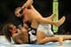 Aug 31, 2013; Milwaukee, WI, USA; Chad Mendes (top) fights Clay Guida during the UFC-164 bout at BMO Harris Bradley Center. Mandatory Credit: Benny Sieu-USA TODAY Sports
