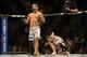 Apr 20, 2013; San Jose, CA, USA; Chad Mendes (left) celebrates after defeating Darren Elkins (right) during the featherweight bout prelims of the UFC on Fuel TV at HP Pavilion. Mandatory Credit: Kyle Terada-USA TODAY Sports