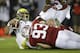 PALO ALTO, CA - NOVEMBER 07: Quarterback Marcus Mariota #8 of the Oregon Ducks is sacked by linebacker Trent Murphy #93 of the Stanford Cardinal in the first quarter at Stanford Stadium on November 7, 2013 in Palo Alto, California. (Photo by Ezra Shaw/G