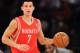 NEW YORK, NY - NOVEMBER 14: Jeremy Lin #7 of the Houston Rockets carries the ball down court during the first quarter against the New York Knicks at Madison Square Garden on November 14, 2013 in New York City. NOTE TO USER: User expressly acknowledges and