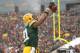 GREEN BAY, WI - DECEMBER 08: Andrew Quarless #81 of the Green Bay Packers celebrates after making a catch in the endzone for a touchdown during the second half of play against the Atlanta Falcons at Lambeau Field on December 08, 2013 in Green Bay, Wiscons