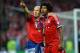 LONDON, ENGLAND - MAY 25: Arjen Robben of Bayern Muenchen (L) celebrates victory with team mate Dante after the UEFA Champions League final match between Borussia Dortmund and FC Bayern Muenchen at Wembley Stadium on May 25, 2013 in London, United Kingdo