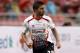 BANGKOK, THAILAND - JULY 28: Fabio Borini of Liverpool runs with the ball during the international friendly match between Thailand and Liverpool at the Rajamangala Stadium on July 28, 2013 in Bangkok, Thailand. (Photo by Stanley Chou/Getty Images)