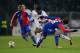 BASEL, SWITZERLAND - NOVEMBER 26: Samuel Eto'o of Chelsea slips the tackle of Fabian Salah of FC Basel during the UEFA Champions League Group E match between FC Basel 1893 and Chelsea at St. Jakob-Park on November 26, 2013 in Basel, Switzerland. (Photo