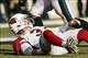 Dec 1, 2013; Philadelphia, PA, USA; Arizona Cardinals quarterback Carson Palmer (3) gets up after being sacked during the first quarter against the Philadelphia Eagles at Lincoln Financial Field. Mandatory Credit: Howard Smith-USA TODAY Sports