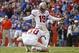 Nov 30, 2013; Gainesville, FL, USA; Florida State Seminoles kicker Roberto Aguayo (19) kicks an extra point against the Florida Gators during the second half against the Florida Gators at Ben Hill Griffin Stadium. Florida State Seminoles defeated the Flor