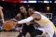 November 20, 2013; Oakland, CA, USA; Memphis Grizzlies point guard Mike Conley (11, left) and Golden State Warriors small forward Andre Iguodala (9, right) fight for the ball during the fourth quarter at Oracle Arena. The Grizzlies defeated the Warriors 8