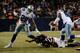 CHICAGO, IL - DECEMBER 9: DeMarco Murray #29 of the Dallas Cowboys runs over Tim Jennings #26 of the Chicago Bears during the second quarter on December 9, 2013 at Soldier Field in Chicago, Illinois. (Photo by David Banks/Getty Images)