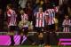 SUNDERLAND, ENGLAND - DECEMBER 07: Adam Johnson of Sunderland celebrates scoring the opening goal with team-mate Jozy Altidore during the Barclays Premier League match between Sunderland and Tottenham Hotspur at Stadium of Light on December 07, 2013 in Su