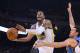November 14, 2013; Oakland, CA, USA; Golden State Warriors small forward Andre Iguodala (9, left) shoots the ball against Oklahoma City Thunder power forward Nick Collison (4, right) during the third quarter at Oracle Arena. The Warriors defeated the Thun