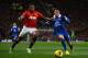 MANCHESTER, ENGLAND - DECEMBER 04: Luis Antonio Valencia of Manchester United competes with Bryan Oviedo of Everton during the Barclays Premier League match between Manchester United and Everton at Old Trafford on December 4, 2013 in Manchester, England.
