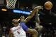 HOUSTON, TX - DECEMBER 08: Terrence Jones #6 of the Houston Rockets blocks a shot from Glen Davis #11 of the Orlando Magic at Toyota Center on December 8, 2013 in Houston, Texas. NOTE TO USER: User expressly acknowledges and agrees that, by downloading