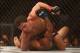 Sep 22, 2012; Toronto, ON, Canada; UFC fighter Joseph Benavidez (top) fights against fighter Demetrious Johnson in the flyweight championship bout at UFC 152 at the Air Canada Centre. Mandatory Credit: Tom Szczerbowski-USA TODAY Sports