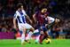 BARCELONA, SPAIN - NOVEMBER 01: Xavi Hernandez of FC Barcelona duels for the ball with Victor Sanchez (L) and Sergio Garcia of RCD Espanyol during the La Liga match between FC Barcelona and RCD Espanyol at Camp Nou on November 1, 2013 in Barcelona, Spain