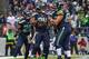 SEATTLE, WA - NOVEMBER 17: Running back Marshawn Lynch #24 of the Seattle Seahawks celebrates with teammates after scoring a touchdown in the fourth quarter against the Minnesota Vikings at CenturyLink Field on November 17, 2013 in Seattle, Washington. T