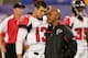 MINNEAPOLIS, MN - SEPTEMBER 09: Starting quarterback Joey Harrington #13 of the Atlanta Falcons shares some words with offensive coordinator Hue Jackson during warm up prior to facing the Minnesota Vikings during week one NFL action at the Metrodome on S