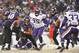 BALTIMORE, MD - DECEMBER 08: Running back Ray Rice #27 of the Baltimore Ravens runs the ball against the Minnesota Vikings at M&T Bank Stadium on December 8, 2013 in Baltimore, Maryland. The Ravens defeated the Vikings 29-26. Photo by Larry French/Getty