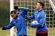 ST ALBANS, ENGLAND - DECEMBER 10: Theo Walcott enjoys a joke with Thomas Vermaelen during an Arsenal training session ahead of their UEFA Champions League group F match against Napoli at London Colney on December 10, 2013 in St Albans, England. (Photo b