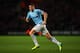SOUTHAMPTON, ENGLAND - DECEMBER 07: James Milner of Manchester City in action during the Barclays Premier League match between Southampton and Manchester City at St Marys Stadium on December 07, 2013 in Southampton, England. (Photo by Bryn Lennon/Getty