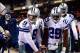 Dec 9, 2013; Chicago, IL, USA; Dallas Cowboys quarterback Tony Romo (9) warms his hands on the heater during the second quarter against the Chicago Bears at Soldier Field. Mandatory Credit: Andrew Weber-USA TODAY Sports