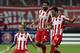 ATHENS, GREECE - SEPTEMBER 17: Vladimir Weiss of Olympiacos FC celebrates scoring a goal with his team-mates during the UEFA Champions League group stage match between Olympiacos FC and Paris Saint-Germain FC held on September 17, 2013 at the Georgios Ka