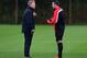 MANCHESTER, ENGLAND - OCTOBER 22: David Moyes the manager of Manchester United talks with Robin Van Persie prior to a training session at Aon Training Complex on October 22, 2013 in Manchester, England. (Photo by Alex Livesey/Getty Images)
