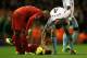 LIVERPOOL, ENGLAND - DECEMBER 07: Kevin Nolan of West Ham United reacts to Jordan Henderson of Liverpool during the Barclays Premier League match between Liverpool and West Ham United at Anfield on December 7, 2013 in Liverpool, England. (Photo by Clive