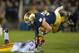 Oct 19, 2013; South Bend, IN, USA; Notre Dame Fighting Irish running back Cam McDaniel (33) is tackled by Southern California Trojans linebacker Dion Bailey (18) at Notre Dame Stadium. Notre Dame defeated USC 14-10. Mandatory Credit: Kirby Lee-USA TODAY S
