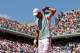 PARIS, FRANCE - JUNE 07: Novak Djokovic of Serbia adjusts his shirt during the men's singles semi-final match against Rafael Nadal of Spain on day thirteen of the French Open at Roland Garros on June 7, 2013 in Paris, France. (Photo by Julian Finney/Get
