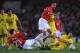 MANCHESTER, UNITED KINGDOM - SEPTEMBER 17: Rio Ferdinand and Jonny Evans of Manchester United challenge Guille Franco of Villareal for the ball during the UEFA Champions League Group E match between Manchester United and Villareal at Old Trafford on Sept
