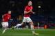 MANCHESTER, ENGLAND - DECEMBER 10: Phil Jones of Manchester United celebrates scoring the opening goal during the UEFA Champions League Group A match between Manchester United and Shakhtar Donetsk at Old Trafford on December 10, 2013 in Manchester, Engla