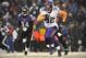 BALTIMORE, MD - DECEMBER 08: Running back Toby Gerhart #32 of the Minnesota Vikings runs the ball in for a touchdown against the Baltimore Ravens at M&T Bank Stadium on December 8, 2013 in Baltimore, Maryland. (Photo by Larry French/Getty Images)