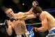 Feb 23, 2013; Anaheim, CA, USA; Court McGee (red gloves) and Hosh Neer (blue gloves) during their UFC welterweight bout at the Honda Center. Mandatory Credit: Jayne Kamin-Oncea-USA TODAY Sports