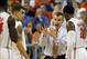 Dec 10, 2013; Gainesville, FL, USA; Florida Gators head coach Billy Donovan talks with guard Michael Frazier II (20), guard Scottie Wilbekin (5) and teammates against the Kansas Jayhawks during the second half at Stephen C. O'Connell Center. Florida Gator