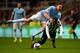 NEWCASTLE UPON TYNE, ENGLAND - OCTOBER 30: Javi Garcia of Manchester City clashes with Massadio Haidara of Newcastle United during the Capital One Cup Fourth Round match between Newcastle United and Manchester City at St James' Park on October 30, 2013 i