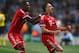 MANCHESTER, ENGLAND - OCTOBER 02: Franck Ribery (R) of Muenchen celebrates scoring the opening goal with David Alaba of Muenchen during the UEFA Champions League Group D match between Manchester City and FC Bayern Muenchen at Etihad Stadium on October 2,