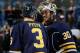 BUFFALO, NY - DECEMBER 10: Ryan Miller #30 and Mark Pysyk #3 of the Buffalo Sabres celebrate a 2-1 victory over the Ottawa Senators at First Niagara Center on December 10, 2013 in Buffalo, New York. (Photo by Jen Fuller/Getty Images)