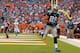 MIAMI GARDENS, FL - NOVEMBER 24: Greg Olsen #88 of the Carolina Panthers catches a game winning touchdown during a game against the Miami Dolphins at Sun Life Stadium on November 24, 2013 in Miami Gardens, Florida. (Photo by Mike Ehrmann/Getty Images)