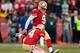 SAN FRANCISCO, CA - DECEMBER 08: Kicker Phil Dawson #9 of the San Francisco 49ers kicks the game-winning field goal against the Seattle Seahawks late in the fourth quarter on December 8, 2013 at Candlestick Park in San Francisco, California. The 49ers w