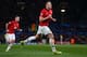 MANCHESTER, ENGLAND - DECEMBER 10: Phil Jones of Manchester United celebrates scoring the opening goal during the UEFA Champions League Group A match between Manchester United and Shakhtar Donetsk at Old Trafford on December 10, 2013 in Manchester, Engla
