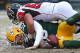 GREEN BAY, WI - DECEMBER 08: Matt Flynn #10 of the Green Bay Packers is sacked by Paul Worrilow #55 of the Atlanta Falcons at Lambeau Field on December 8, 2013 in Green Bay, Wisconsin. The Packers defeated the Falcons 22-21. (Photo by Jonathan Daniel/Gett