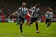 NEWCASTLE UPON TYNE, ENGLAND - OCTOBER 19: Yohan Cabaye of Newcastle United celebrates scoring their first goal with Loic Remy of Newcastle United during the Barclays Premier League match between Newcastle United and Liverpool at St James' Park on Octobe