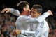 MADRID, SPAIN - OCTOBER 30: Gareth Bale (L) of Real Madrid CF celebrates with Cristiano Ronaldo after scoring Real's opening goal during the La Liga match between Real Madrid CF and Sevilla FC at the Santiago Bernabeu Stadium on October 30, 2013 in Madri