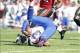 Dec 8, 2013; Tampa, FL, USA; Buffalo Bills quarterback EJ Manuel (3) gets tripped up during the first quarter against the Tampa Bay Buccaneers at Raymond James Stadium. Mandatory Credit: Kim Klement-USA TODAY Sports